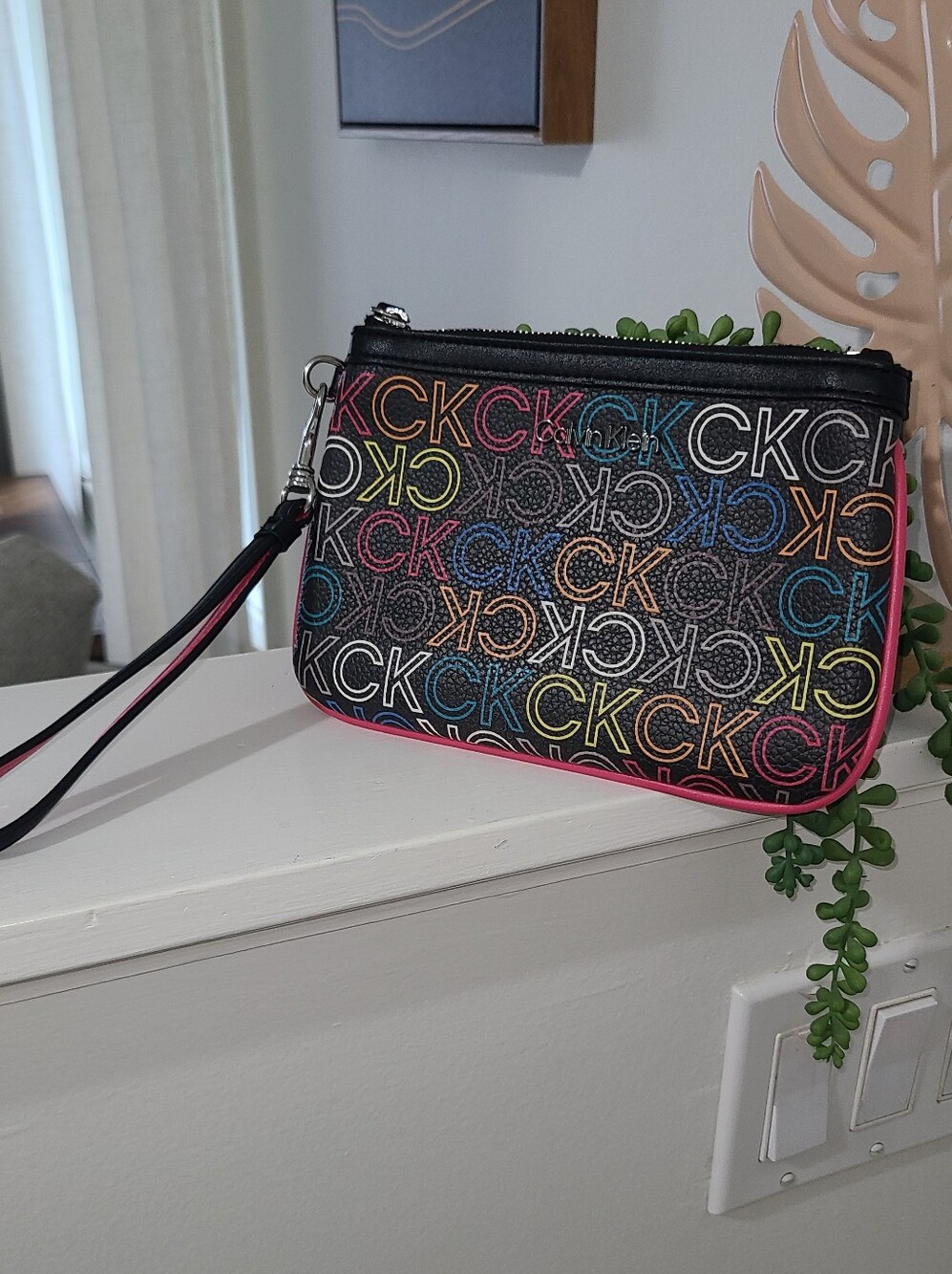 Calvin Klein Black Wristlet Clutch with Multicolor CK Logo and Pink Trim